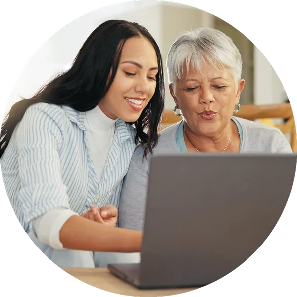 woman on phone with laptop
