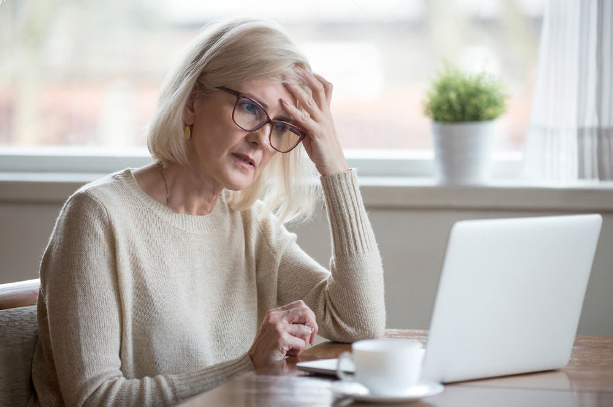 frustrated woman on laptop